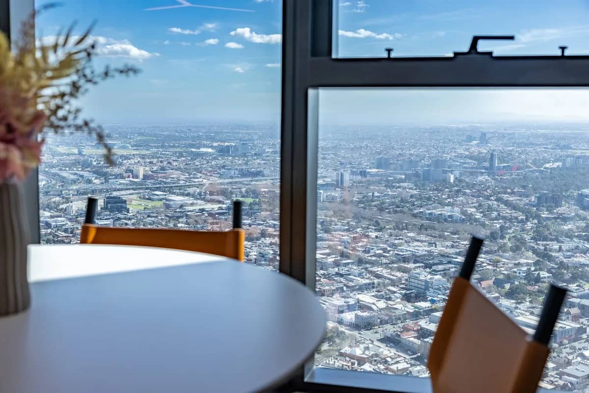 High rise dining table with expansive city skyline view